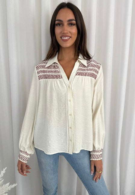 Josie cream/ red blouse
